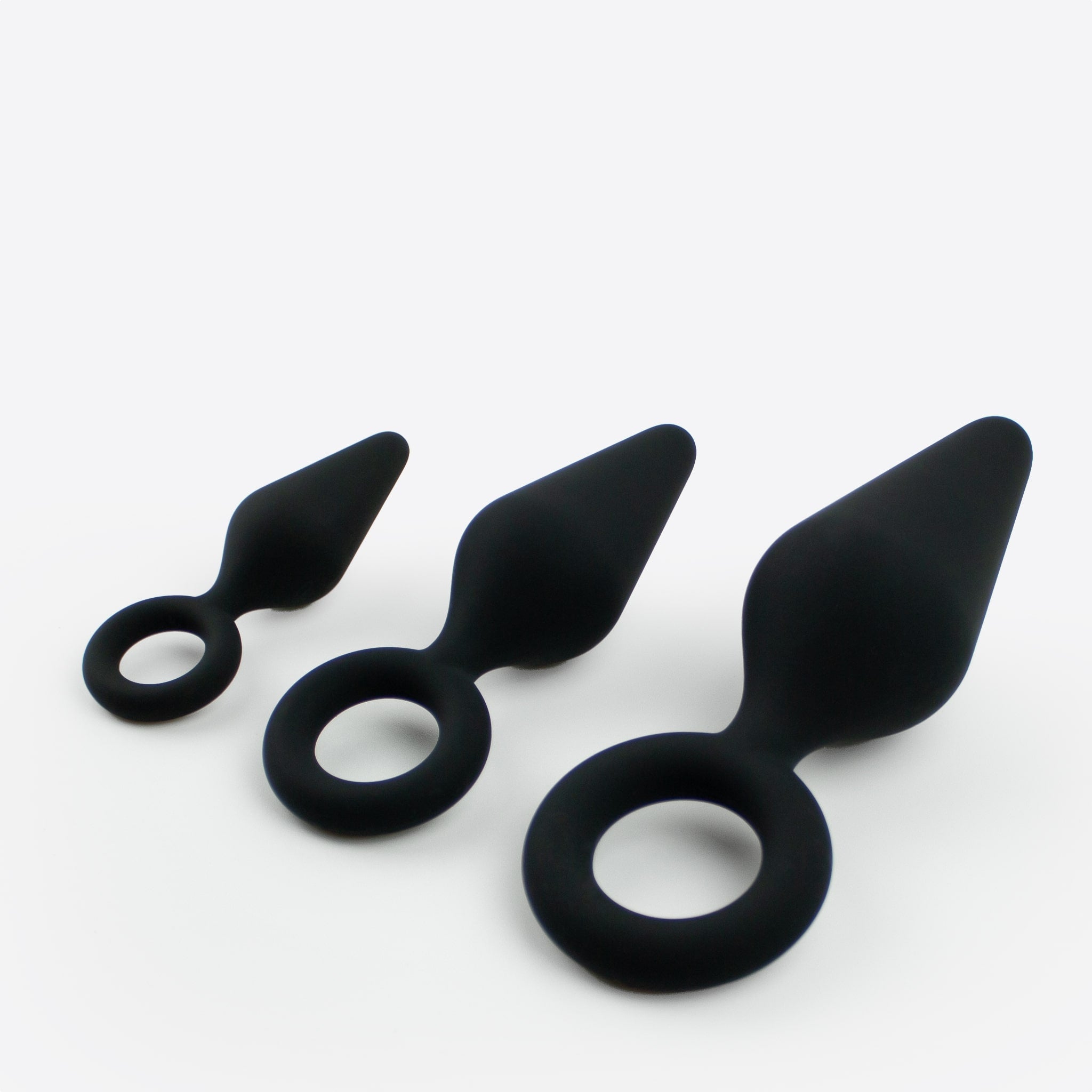 Unilove Dart formede anal plug i sort 3 stk liggende